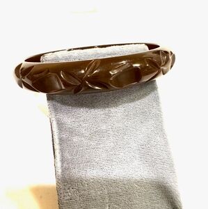Bakelite brown carved bracelet.